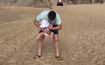 Baby_Doesnt_Want_to_be_Kept_on_Sand.jpg